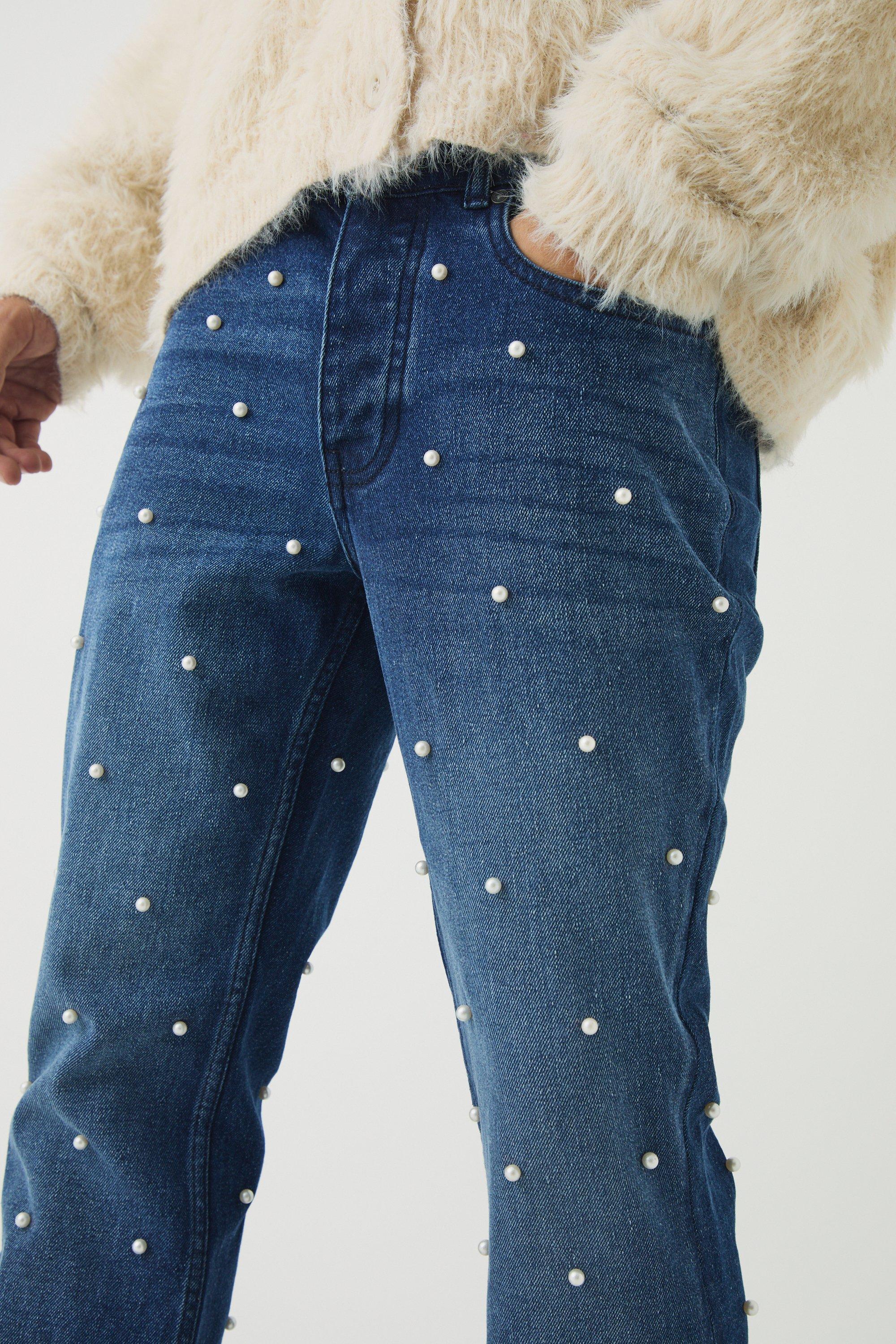 Jeans a zampa Slim Fit in denim rigido decorati con perle